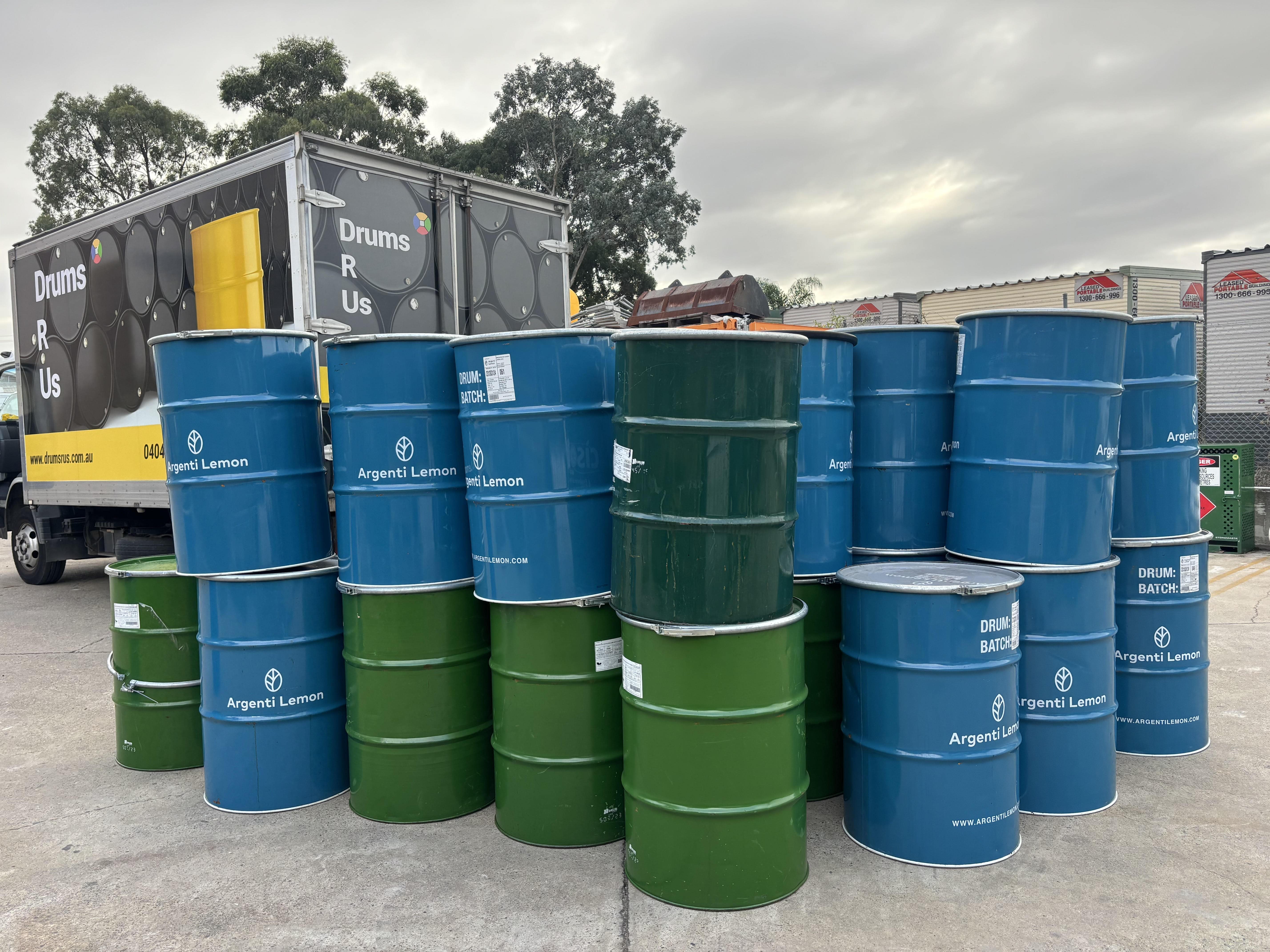 Customer delivery of metal drums used for concrete slurry.
